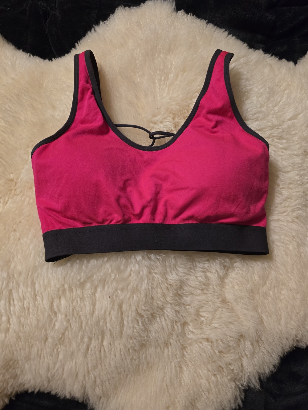 Supportive Hot Pink Sports Bra with Black Trim